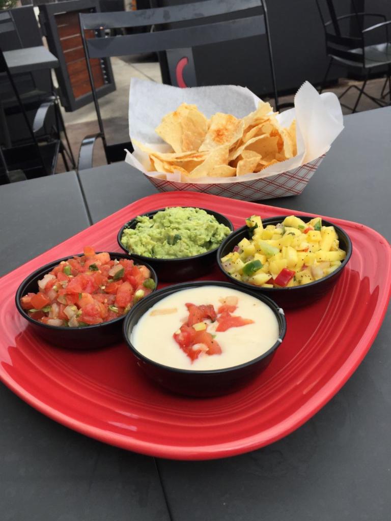 Quattro and Chips · Queso, Guacamole, Salsa, Mango Salsa and Swanky's signature house made chips