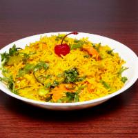Vegetable Biryani · Basmati rice cooked with fresh vegetables, herbs and spices.