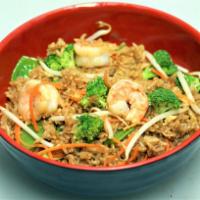 House Fried Rice · Our wok-fried rice with broccoli, carrots, snow peas, bean sprouts, egg, and scallions. Serv...