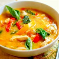 Thai Red Curry · A sumptuous blend of homemade Thai red curry with coconut milk and vegetables. Served with c...