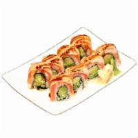 Pyro Seared Salmon Roll · Inside avocado and cucumber. On top: seared salmon, spicy mayo and eel sauce. 