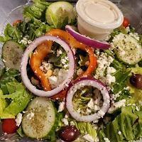Greek Salad · Crispy lettuce, tomatoes, fresh peppers, olives, cucumbers, red onions and feta. A classic.