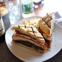 Chicken Ala Melanese Sandwich · Hand breaded chicken, roasted peppers, mix greens, fresh mozzarella and balsamic.