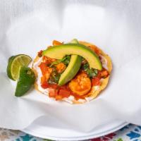 Shrimp Tostada · Tostada topped w/ shrimp, mayo, pico de gallo, hot sauce, and avocado. Includes a small side...
