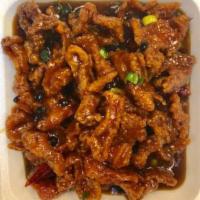 Twice Cooked Beef · Deep fried beef in a spicy black bean brown sauce. Hot and spicy.