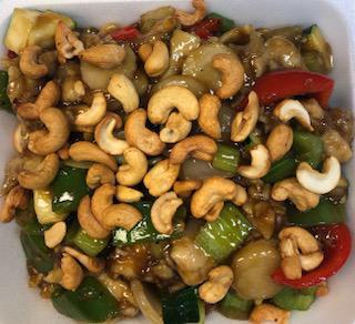 Cashew Nut Chicken · Stir fried chicken with bell pepper, onion, water chestnut, zucchini in a brown sauce with cashew nuts. White meat.