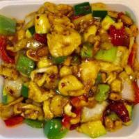 Kung Pao Chicken · Stir fried chicken with bell pepper, onion, zucchini, water chestnut, peanut in a garlic bro...