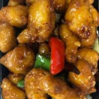 General Tso Chicken · Deep fried chicken in a brown spicy sauce. White meat. Hot and spicy.