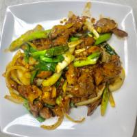 Spicy Bourbon Chicken (Dark Meat) · Sauteed with onions in a spicy sauce