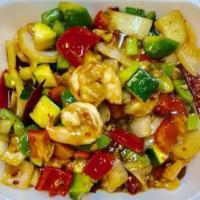 Kung Pao Shrimp · Stir fried shrimp with bell pepper, onion, zucchini, water chestnut, peanut in a garlic brow...
