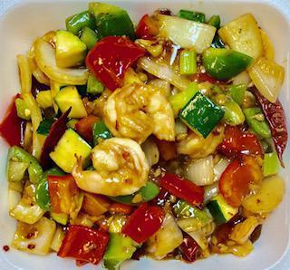 Kung Pao Shrimp · Stir fried shrimp with bell pepper, onion, zucchini, water chestnut, peanut in a garlic brown sauce. Hot and spicy.