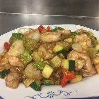Garlic Shrimp · Stir fried shrimp with bell pepper, onion, water chestnut, zucchini in a brown sauce.
