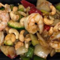 Cashew Nut Shrimp · Stir fried shrimp with bell pepper, onion, water chestnut, zucchini in a brown sauce with ca...
