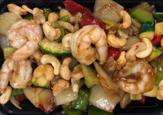 Cashew Nut Shrimp · Stir fried shrimp with bell pepper, onion, water chestnut, zucchini in a brown sauce with cashew nuts.