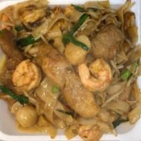 Seafood Chow Fun  (Shrimp, Scallop and Fish) · Stir fried thick rice noodle  with bean sprout, carrot, cabbage and white & green onions .