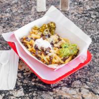 ASADA FRIES  · FRIES TOPPED WITH QUESO, YOUR CHOICE OF MEAT AND SIDE OF GUACAMOLE, SOUR CREAM AND JALAPEÑOS.
