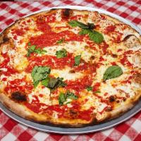 Regular Pizza · Fresh mozzarella, crushed tomatoes and basil.