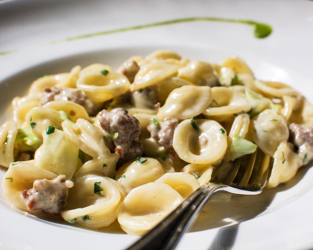 Orecchiette salsiccia e cime di rapa  · Homemade orecchiette pasta - garlic-  sweet Italian sausage - broccoli rabe