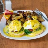 Egg Florentine Breakfast · 2 poached eggs on a scratch made biscuit or English muffin, spinach, tomato and fresh house ...