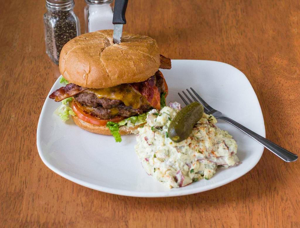 Beef and Bacon Burger · Two 100% Angus 1/4lb beef patties (served well done), crispy bacon, Tillamook cheddar cheese, pickled onion, fresh tomato, lettuce and spicy house mayo served on a toasted Pub Bun.