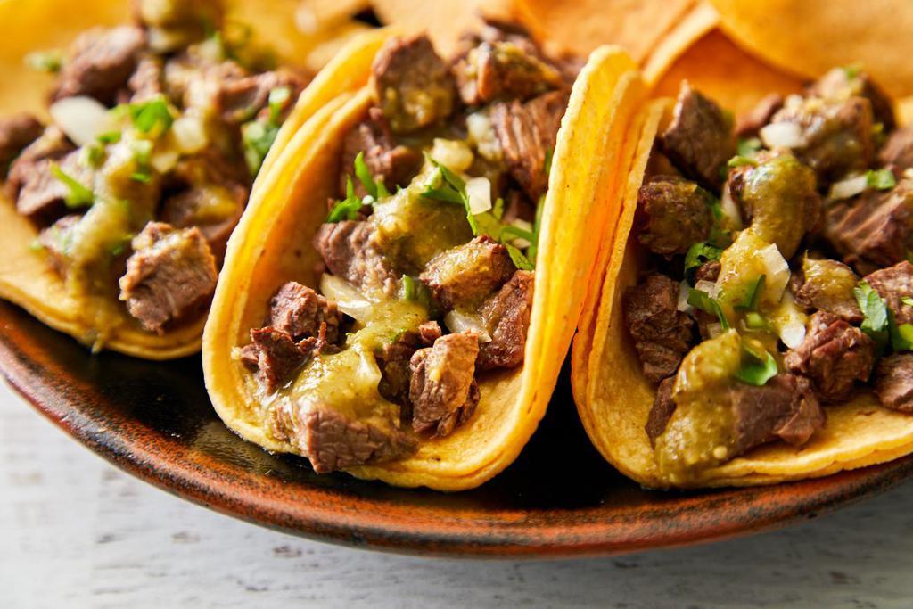Asian Short Rib Taco Platter · 3 tacos served with fresh tortilla chip and pico de gallo