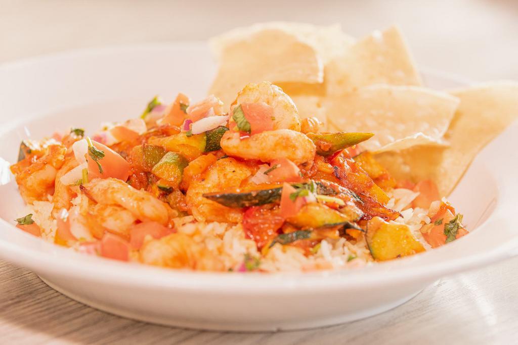 Grilled Shrimp Rice Bowl  · grilled shrimp, fajita veggies, guacamole, rice served with pico de gallo and tortilla chips.