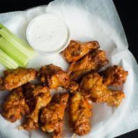 Buffalo Wings · Tasty wings served with celery sticks and your choice of dipping sauce. Served with ranch or...