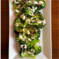 Charred Broccoli · Charred and Tossed with Citrus Vinaigrette. Topped with Tahini and Sesame Seeds