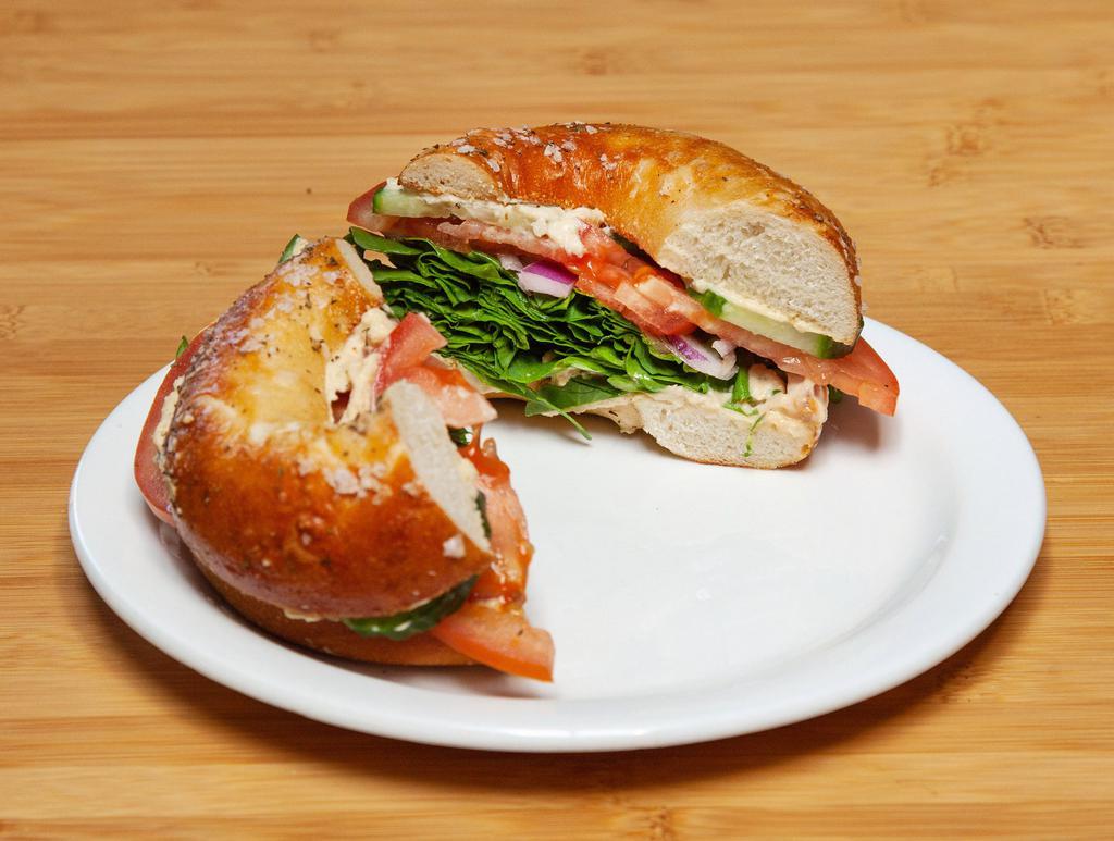 Captain Planet  · Your choice of bagel topped with our house hummus, greens, tomato, cucumber, sprouts, and onion.