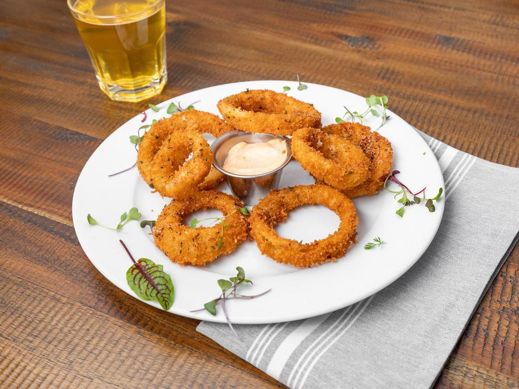 8 House-Made Onion Rings · Beer battered onion rings with 9900 dipping sauce.