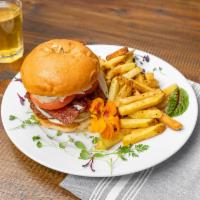 Cajun Fried Chicken Sandwich · Cajun fried chicken breast, mayo, lettuce, tomato, bacon, provolone, ranch served on a brioc...