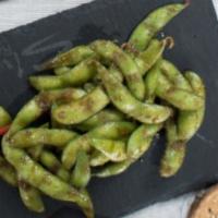 Spicy Soy Garlic Edamame · Soy garlic edamame dashed with red chili flakes.