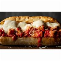 Chicken Parmesan Sub · Classic sub layered with grilled chicken, premium mozzarella and pizza sauce, topped with sh...