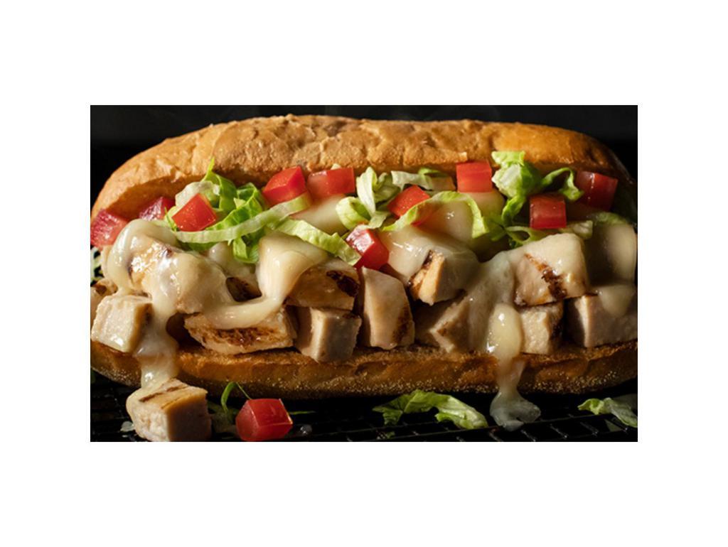 GRILLED CHICKEN CLASSIC SUB · Classic sub layered with grilled chicken and provolone toasted to a golden, crunchy crust. Topped with lettuce and tomatoes. Served with a side of Italian dressing.