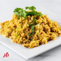 Curry Fried Rice · Fried rice stir fried with curry powder, your choice of meat, egg, yellow onion, scallion an...