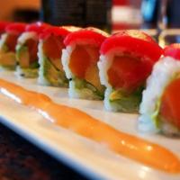 Sakura Roll · Salmon and avocado in soy paper topped w/ tuna, spicy mayo and wasabi sauce.