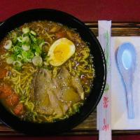 Curry Ramen · Soy sauce soup base with curry sauce, pork, spinach bamboo shoots, corn, battered onion, and...