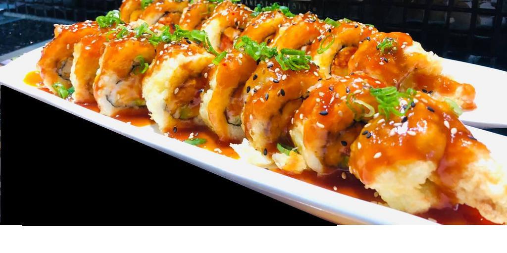 Champ Roll · Deep-fried: cream cheese, avocado, shrimp tempura, spicy crab, topped with authentic spicy sauce.