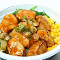 BBQ Albacore Bowl · Torch seared albacore tuna with spicy mayo, corn, seaweed salad, sunomono, and green onion.
