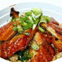 Unagi Bowl · Roasted BBQ eel over sushi or brown rice with teriyaki sauce topped with seaweed salad and g...