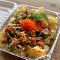 Poke Nachos · Served on top of our crispy wonton chips Your Choice of 2 Proteins mix with Jalapeños, cilan...