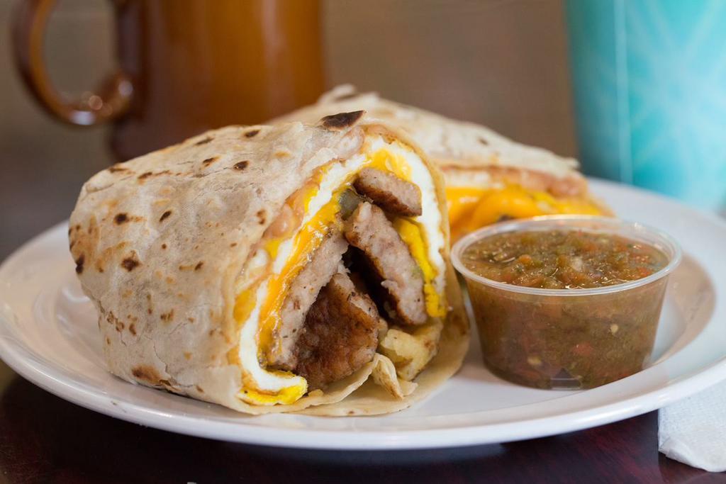 Breakfast Burritos · 3 eggs, carne asada, ham, bacon or sausage with cheese, refried beans, salsa, and potatoes.