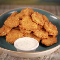 Fried Pickles · Hand-breaded dill pickle chips, served with our ranch dipping sauce.