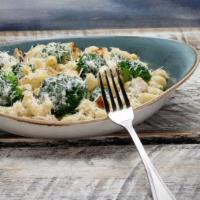 Chicken and Broccoli Pasta · Chicken and broccoli tossed with cavatappi pasta in Alfredo cream sauce, topped with Parmesa...