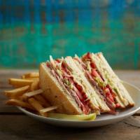 Beach Club · Sliced roasted turkey and ham, Swiss cheese, applewood-smoked bacon, lettuce, tomatoes and H...