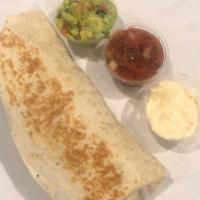 Burrito · Delicious Burrito made with Rice, Beans, and your choice of meat