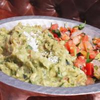 Guacamole Dip · Perfected recipe made with ripe avocados, lime, cilantro,  tomatoes, onions, jalapenos and c...