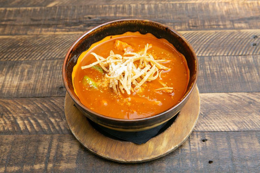 Chicken Tortilla Soup · Roasted tomato and pasilla chile broth, chicken, crispy tortilla strips, avocado, mexican cheese. (GF when served without tortilla strips)