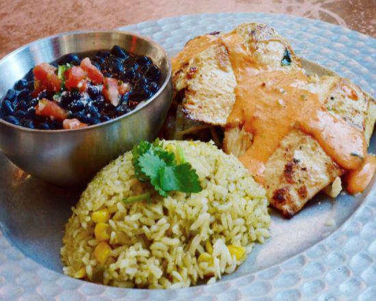 Habanero Mango Chicken · Grilled chicken breast, red and green peppers, mushrooms, corn, sweet habanero sauce, poblano rice, black beans, spinach and tortillas.