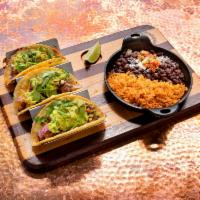 El Chignon Tacos · Steak, queso, and salsa cascabel. Gluten free with corn tortilla.
